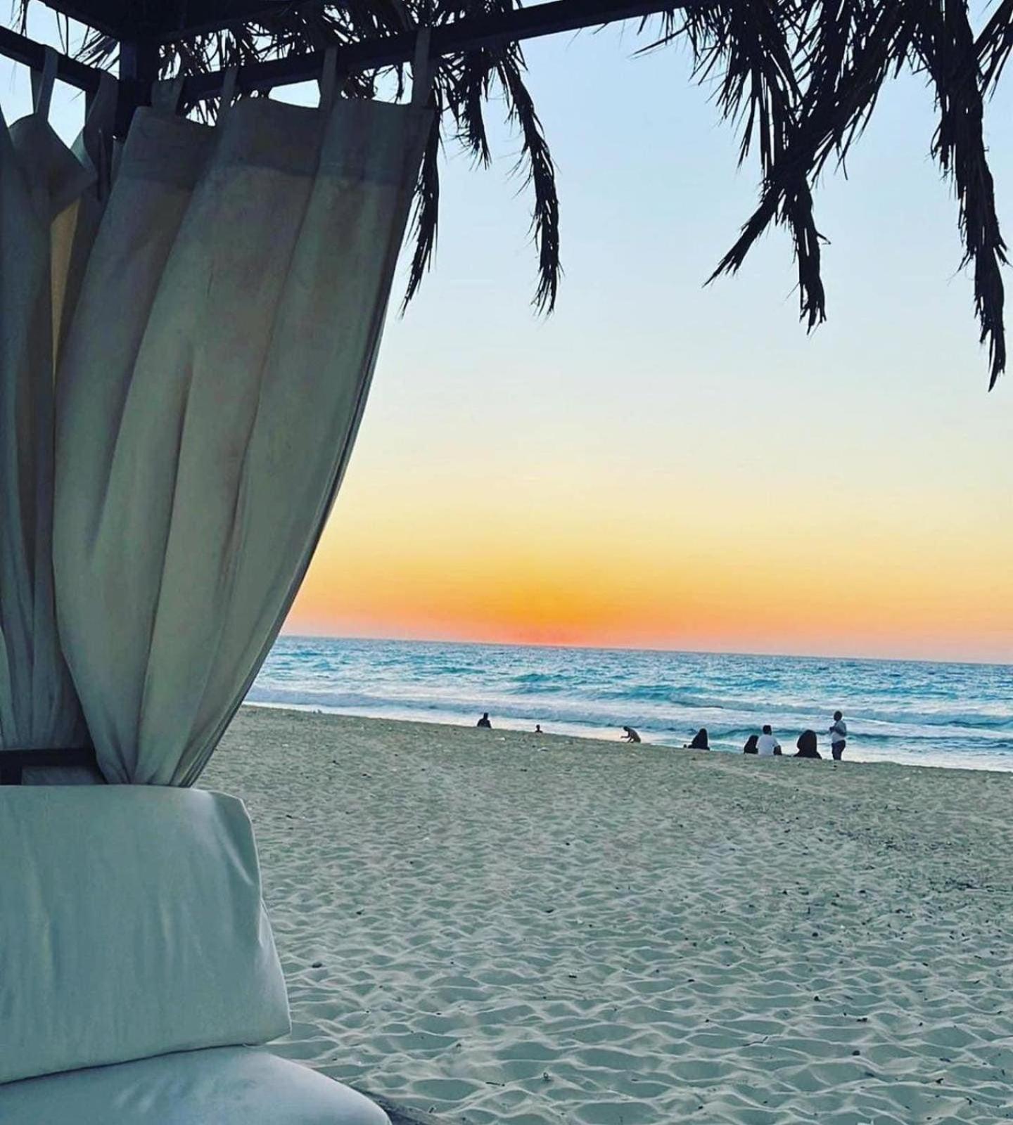보그 엘 아랍 비치 호텔 보르그 엘 아랍 외부 사진 Sunset at the beach