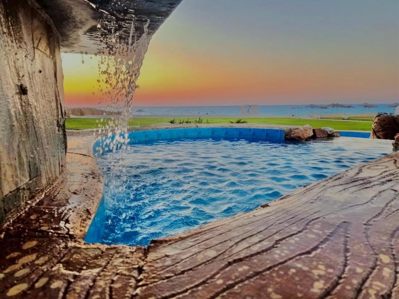 보그 엘 아랍 비치 호텔 보르그 엘 아랍 외부 사진 Sunset at the beach